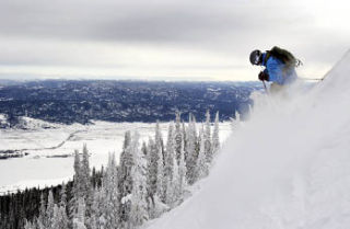 John Naye takes advantage of the abundant powder snow in the backcountry of the Tamarack Ski Resort in Idaho