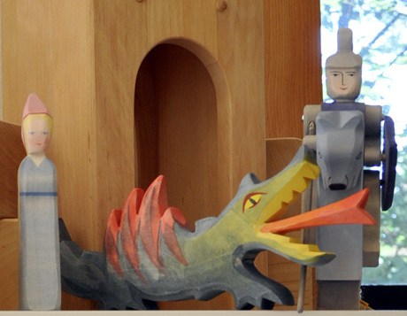 A handcrafted wooden castle set is an example of the craftsmanship found at the Island’s newest toy store