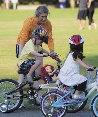 Dolly gets a ride with friends at Mercerdale Park on Sunday