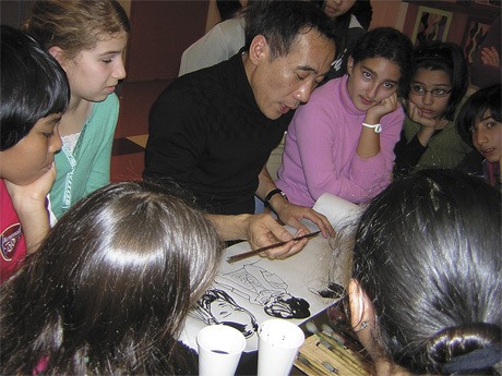 Renowned children’s book illustrator and author Chen Jiang Hong visits with students at the French American School last week to share his art.