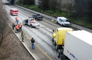 A semi-truck and commercial van crashed on 1-90 near the Mercer Island Exit 9 on March 20.