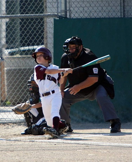 Mercer Island 9- to 10-year-old All-Star Drew Christofferson launches one deep.
