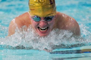 Islander Atticus Koontz competes in the 200-yard individual medley against Woodinville at Mary Wayte Pool on Mercer Island on Thursday.