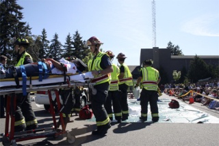 Mercer Island firefighters and police held their annual DUI accident re-enactment for Mercer Island High School students last week. The drill shows students what can happen in a car accident and its aftermath.