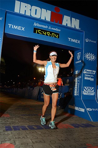 Island resident Debby Wilson crosses the finish line during the 2012 Ironman Wisconsin race. She recently completed the Ironman Canada.