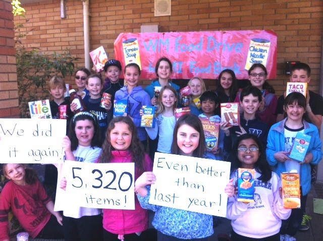 West Mercer students celebrate their record donation to the Mercer Island Food Pantry in March.