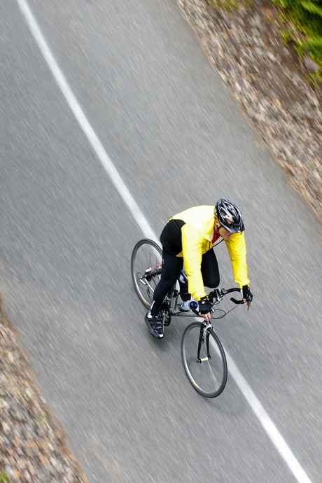 A bicyclist rides through the Park on the Lid on Mercer Island