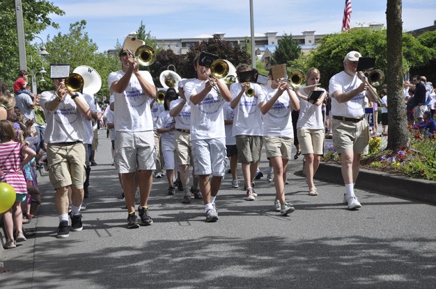 The Mercer Island community band marched in the Summer Celebration parade in July 2011.
