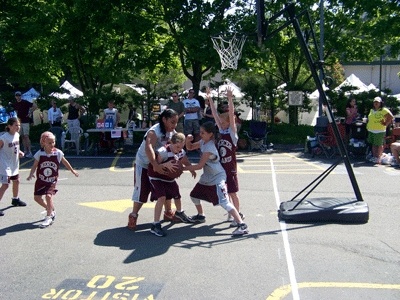 Two girls teams face off during the Summer Celebration! 3-on-3 basketball tournament: (from left to right) Rachel Silke