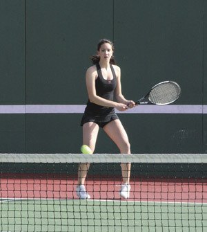 Julia Schubach prepares for a serve during the Mercer Island girls home win over Juanita on Wednesday afternoon.