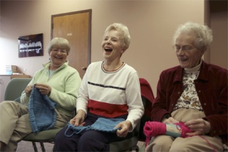 Knitters at the Mercer Island Covenant Church share a laugh as they make warm clothing to send overseas to needy children in Russia. From left: Beverly Harris