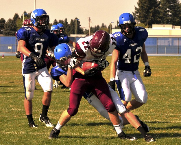 Mercer Island sophomore Jack Counihan scores the Islanders first touchdown during the team's game against Coeur d'Alene on Saturday