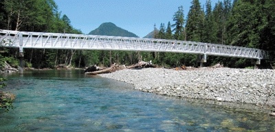 The new aluminum Ice Caves Trail bridge replaces a 1969 wooden bridge which washed away in 2006.