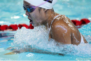 Islander Lauren Deiparine swims a leg of the 200-yard individual medley event during a KingCo league championship preliminary heat at Mary Wayte Pool on Mercer Island