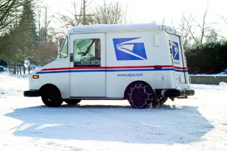 Recent record snowfall on Mercer Island put the USPS motto to the test and pushed others to question global warming.