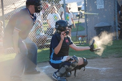 Mercer Island softball all-star Claire McCarthy catches a pitch during the Little League Softball Western Regional Tournament in Vancouver