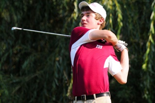 Islanders Crawford Leeds watches his tee shot on the second hole against Juanita at Twin Rivers Golf Course in Fall City