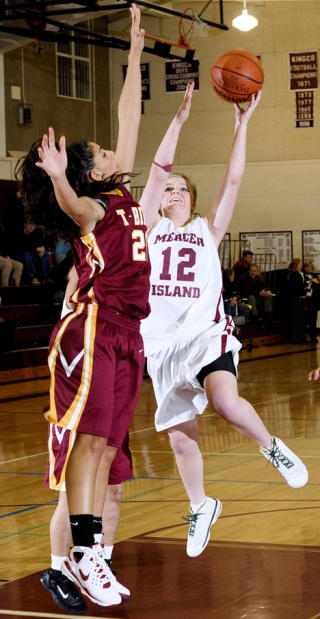 Islander guard Heidi Black (12) drives to the basket against Mount Tahoma at Mercer Island last Wednesday