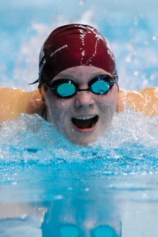 Islanders Madeline Chandless in the 100-yard butterfly event at the King County Aquatic Center in Federal Way