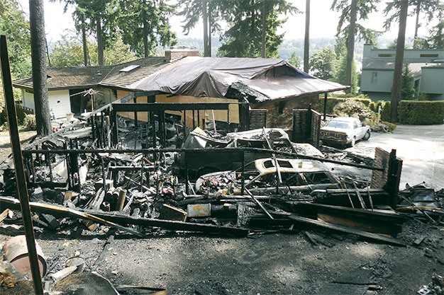 This house in the 5600 block of East Mercer Way is in ruins after a fire on Friday night