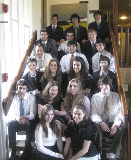 Graduates of Northwest Yeshiva High School Class of 2009 pose on the steps inside the Mercer Island school. They are headed to places as far flung as North Dakota