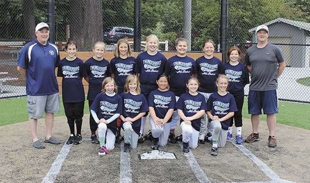 The 2013 District 9 Little League team includes four players from the Mercer Island Little League faspitch teams.