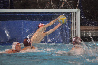 Goalie Hunter Peshkin makes a save for Mercer Island during the San Diego Open water polo tournament. The tournament