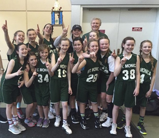St. Monica School’s seventh grade girls basketball team went undefeated in league play this year.