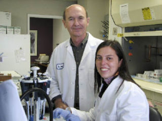Dr. R. Paul Robertson (left)