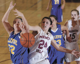 Islander Sarah Taylor battles for a rebound during the third quarter of Mercer Island’s first win in three years against Bellevue.