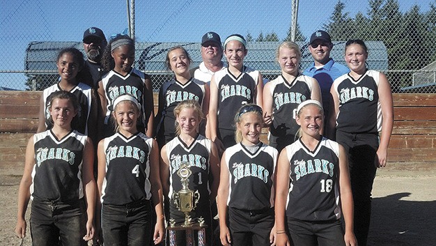 The Northwest Lady Sharks 12U softball team recently won a tournament in Tacoma.