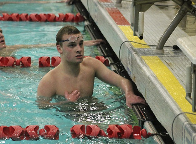 Mercer Island’s David Conger checks his time after winning the 500 freestyle Tuesday