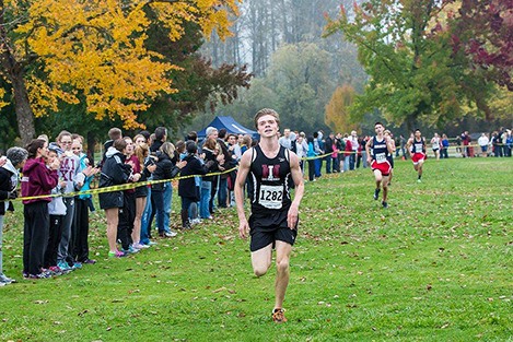 Islander Daniel Mayer heads toward the finish line at the KingCo state Championships at Lake Sammamish State Park.