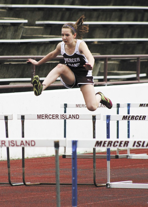 Mercer Island's Haley Snyder clears hurdles during the girls 100 meter race last Thursday. The Islanders were hosting a meet against Garfield.