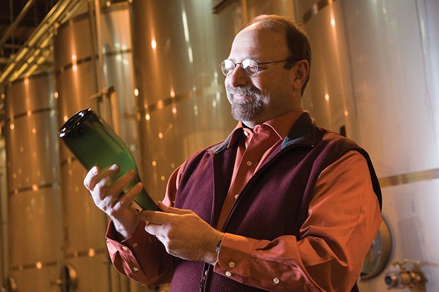 St. Michelle winemaker Rick Casqueiro poses with his sparkling presentation of the brut rose’ of 93 percent pinot noir grapes .