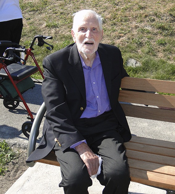 Longtime Islander and Mercer Island Historical Society member and leader Phil Flash was honored for his service to the organization with the dedication of a new bench at the Mercer Island Community and Events Center that bears his name.