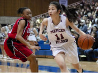 Islander sophomore Jae Shin hit three three-pointers during the first half against Cleveland at Bellevue Community College on Friday.