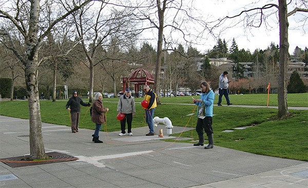 Members of the Concerned Citizens for Mercer Island Parks gather in Mercerdale