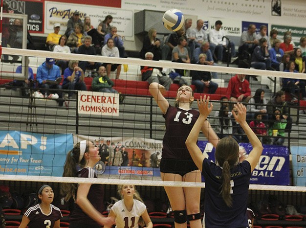 Brooke Behrbaum goes up for the kill during Mercer Island’s fifth-place match against Southridge Saturday