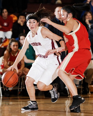 Islander guard Chloe Snethen drives to the basket against Newport on Friday