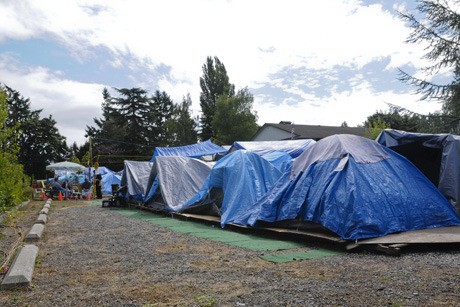 Tents line the grounds of Tent City 4 in August 2008. The United Methodist Church hosted the roving homeless camp for three months in 2008.