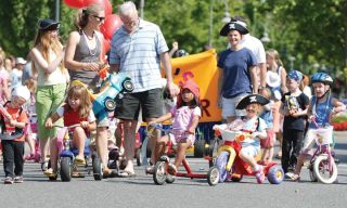 Chad Coleman/Mercer Island Reporter Youngsters from the Mercer Island Preschool Association festooned as rowdy pirates ride in the annual Summer Celebration! parade on Mercer Island Saturday.