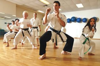 Chad Coleman/Mercer Island Reporter Mercer Island students take part in a Karate West class at the Stroum Jewish Community Center on Mercer Island. The grand opening of Karate West’s new location on the South-end is Aug. 4.