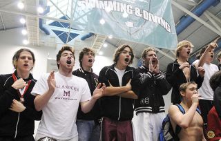 Chad Coleman/Mercer Island Reporter The Mercer Island High School boys swim and dive team won its third consecutive state title on Saturday at the King County Aquatics Center by a record margin of 204 points. Islander teammates