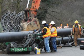 Chad Coleman/Mercer Island Reporter Work continued on the sewer line construction along 84th Ave. SE near Luther Burbank Park on Mercer Island Monday.
