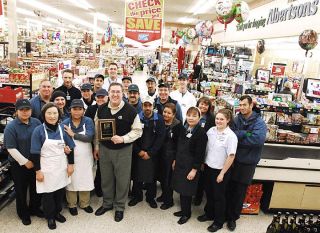 Chad Coleman/Mercer Island Reporter Albertson’s store manager John Gillespie