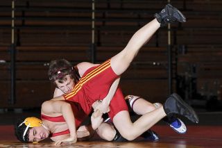 Chad Coleman/Mercer Island Reporter Islander Alex Faith works his opponent for an eventual pin on Wednesday as Mercer Island defeats Newport for the KingCo title.