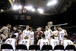 Chad Coleman/Mercer Island Reporter The Mercer Island High School boys basketball team searches for answers during a time-out.