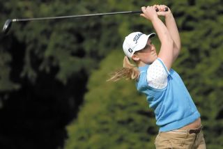 Chad Coleman/Mercer Island Reporter Islander Lindsey Buchanan tees off against Bellevue High School Thursday at Mercer Island’s home course of Jefferson Park in Seattle.