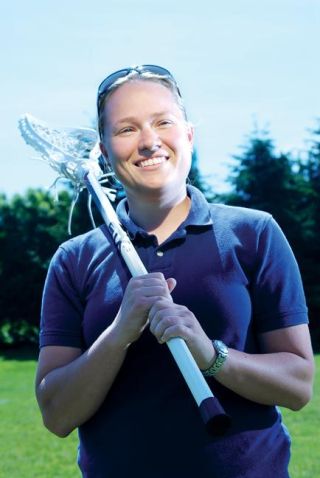 Chad Coleman/Mercer Island Reporter Mercer Island High School graduate Megan Elston is the schools girls lacrosse head coach. Elston won the Coach of the Year award for guiding the Islanders to the state semifinals in her first year.
